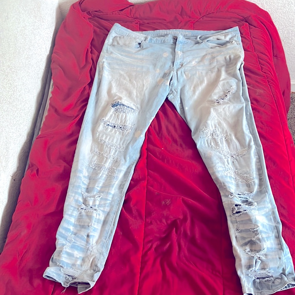 pants are two Months old they are light blue jeans with white